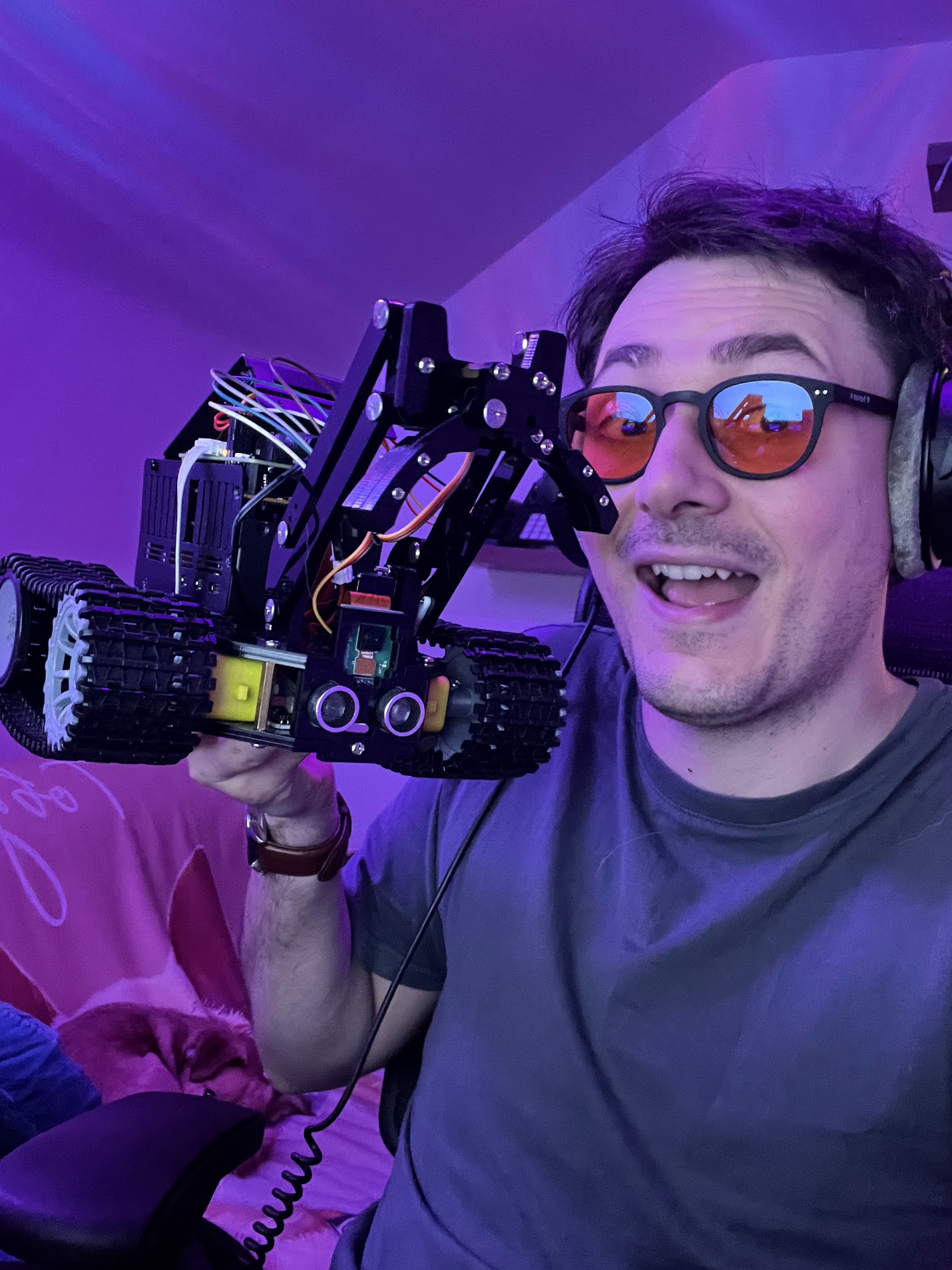 Christos holding the Edge AI Robot